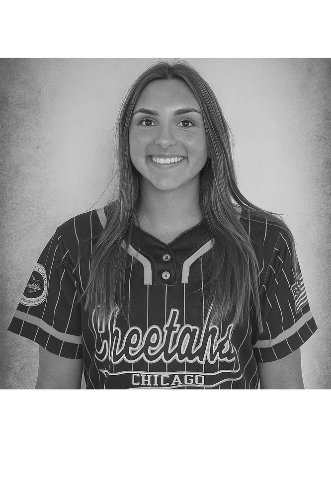 Smiling young woman in a Chicago Cheetahs baseball jersey.
