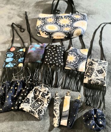 Assortment of trinket bags, pouches and small accessories.  