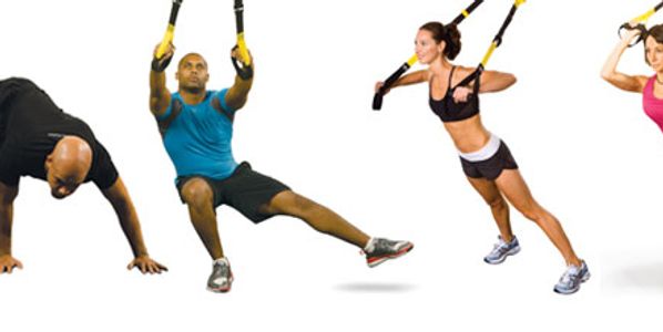 People exercising using suspension training straps in various workout poses.