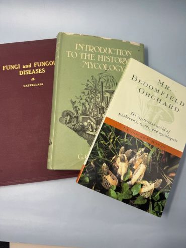 Three books on mycology and fungi diseases.