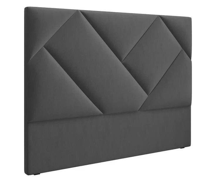 Modern dark grey padded headboard with geometric design.