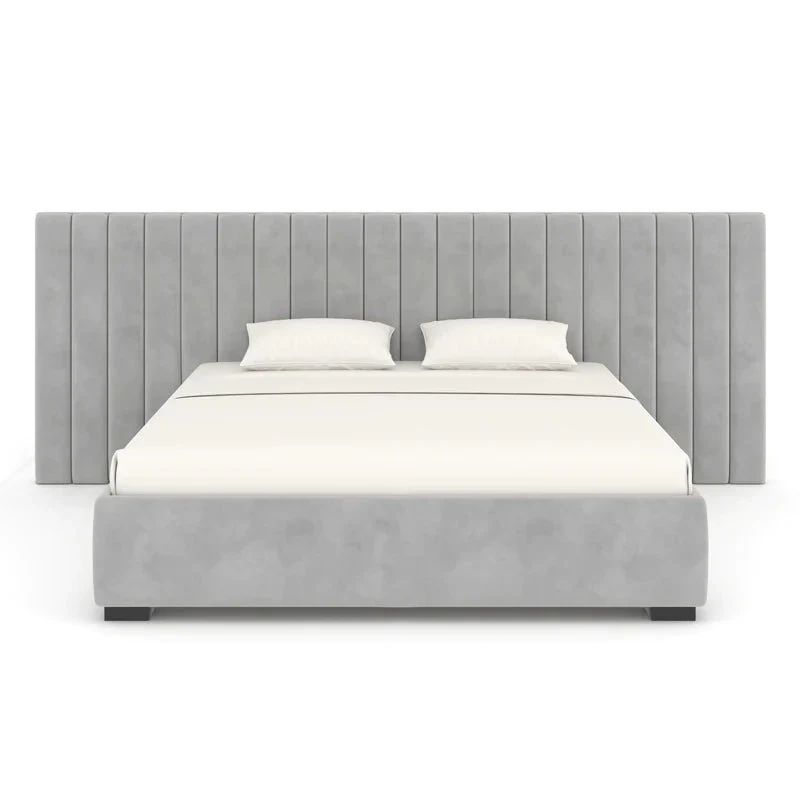 Modern gray upholstered bed with tall headboard.