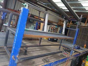 Metal shelving unit in a workshop.