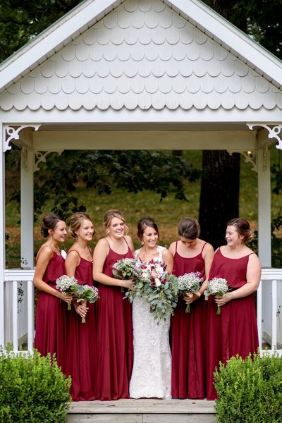 Bride and bridesmaids at White Gizebo 