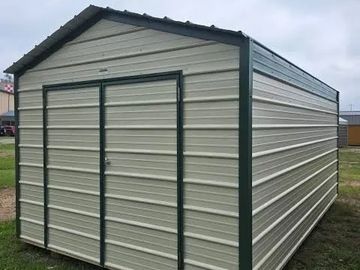 Metal storage shed with double doors.