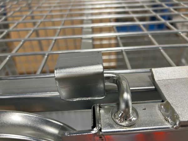 Mobile security cages in use—lockable and built for dealership deliveries.