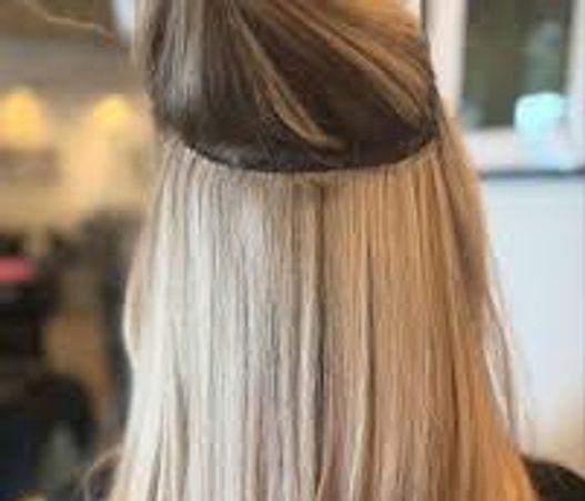 Final installation of the hair extension weft