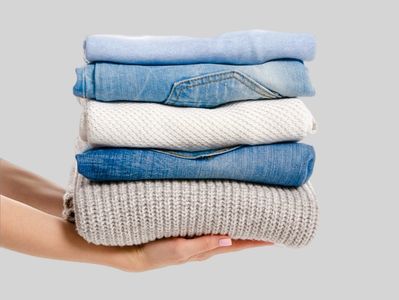 Pile of folds clothes for Wash-and-Fold at Mary’s Laundromart.