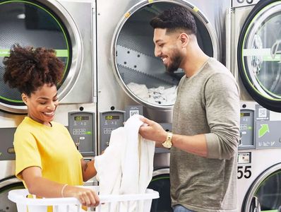 Customers doing laundry at Mary's Laundromart in Lauderdale Lakes.