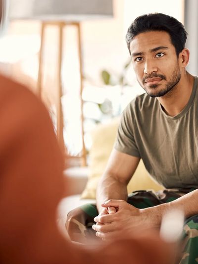 A man in camouflage pants is looking for ADHD testing and therapy.