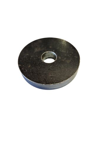 A black metal washer isolated on white background.