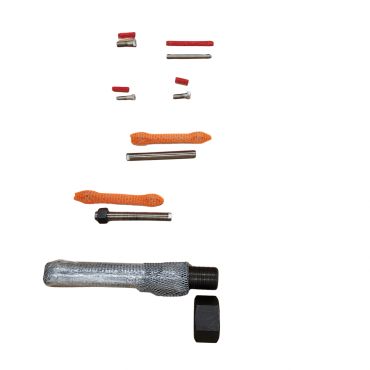Disassembled mechanical parts and tools laid out.