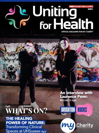 Magazine cover featuring two masked individuals and colorful animal murals.