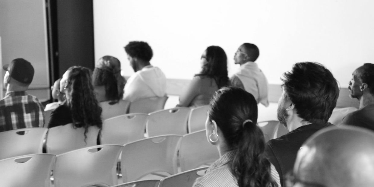 Audience watching a film