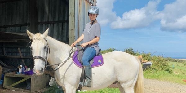Jess from Smith & Snout with her horse in Cornwall