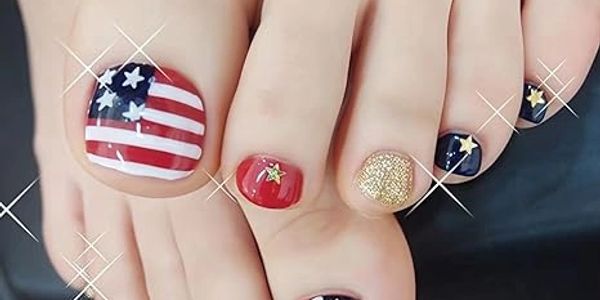 Toes with patriotic American flag and stars nail art.