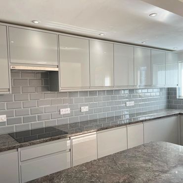 A shiny kitchen, ready for its new owners, serviced by Immaculate Cleaning Wells.