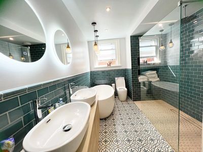 A stunning bathroom, restored to new, by Immaculate Cleaning Wells End of Tenancy services.