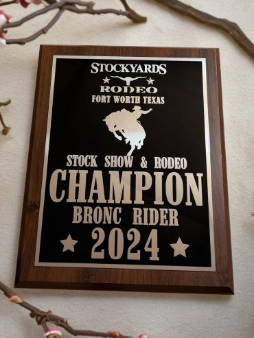 Champion plaque for 2024 Stockyards Rodeo Bronc Rider in Fort Worth, Texas.