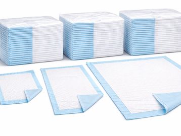 Disposable absorbent underpads with waterproof backing for beds and exam tables.