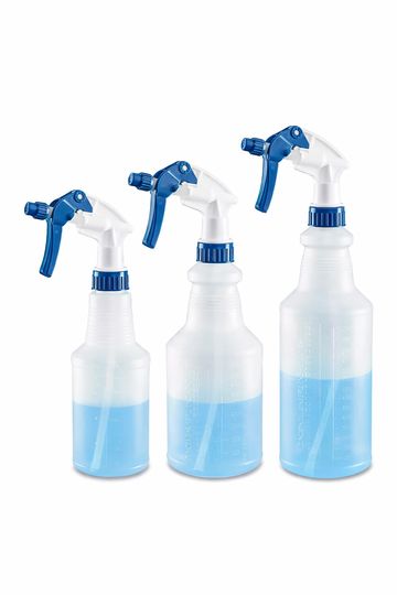 Multiple clear spray bottles lined up with color-coded triggers.
