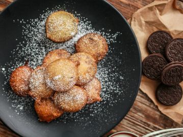 Fried Oreo Cookies dusted with sugar