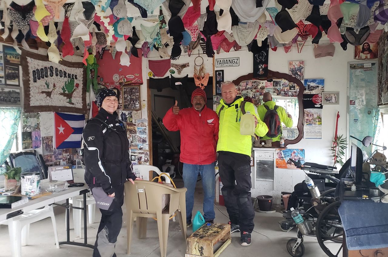 Buying gas by the jug from Nacho at the New Coco's Corner. Buying gas by the jug from Nacho at the New Coco's Corner.