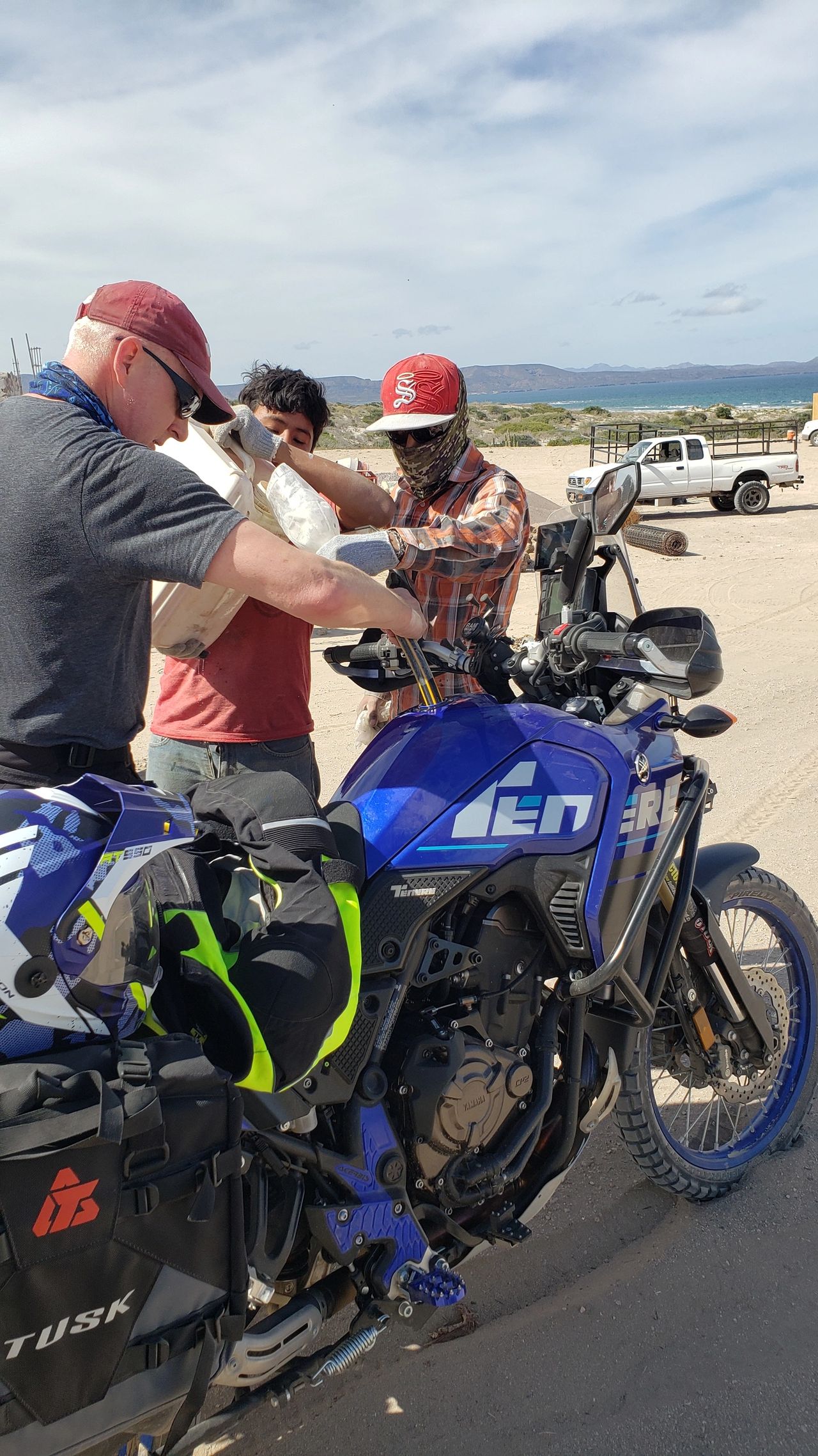 Getting gas topped off by the workers of a new friend we met who showed us his beautiful property along the coast in San Nicolas. Getting gas topped off by the workers of a new friend we met who showed us his beautiful property along the coast in San Nicolas.