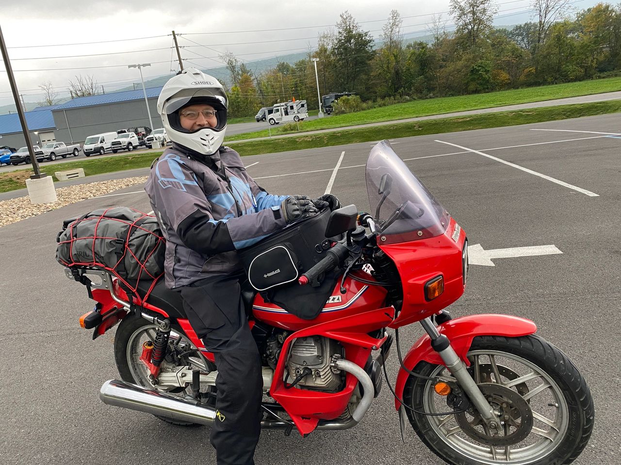 Gina riding the Moto Guzzi V65