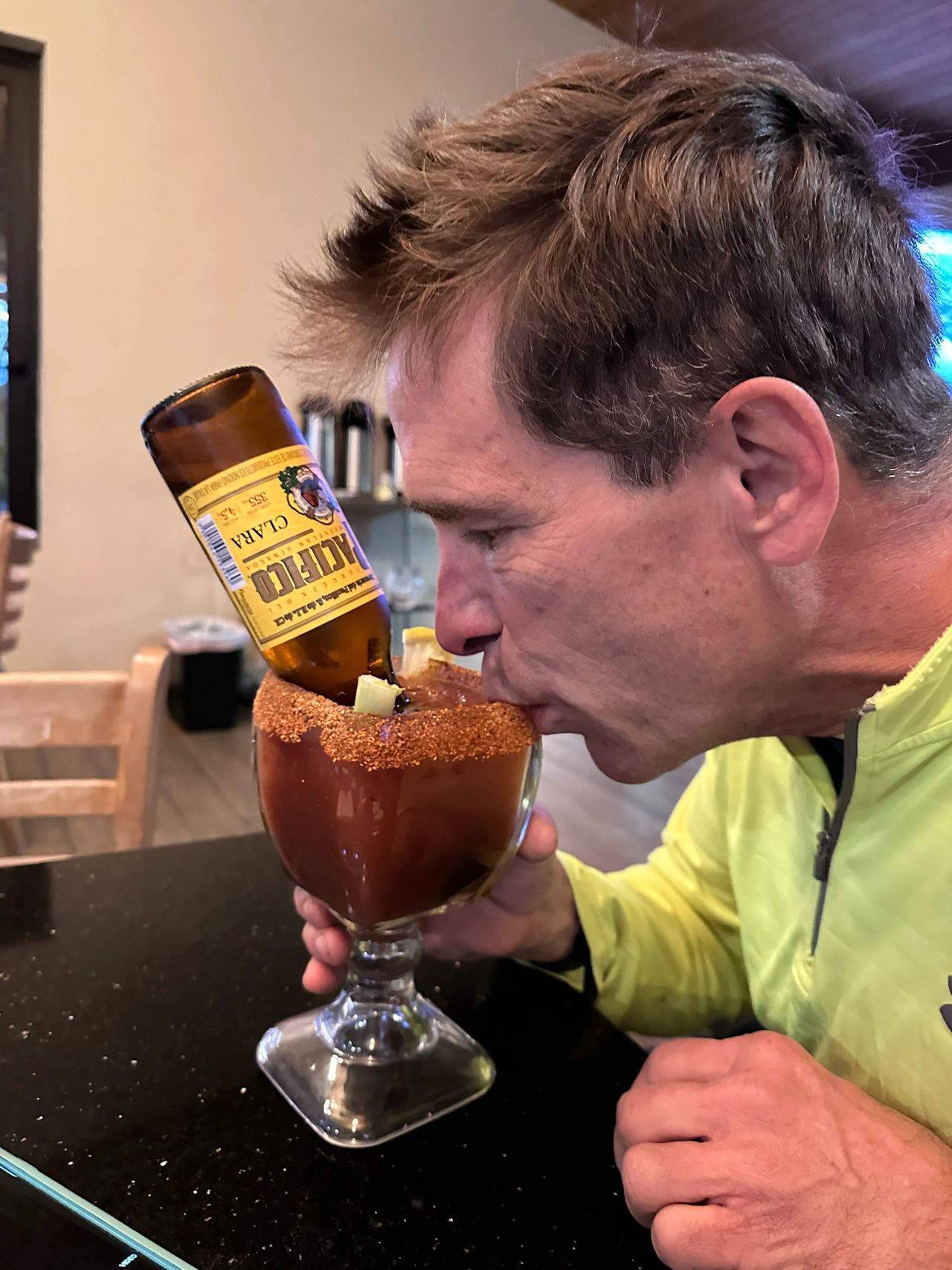 Gene enjoying a Mexican beverage.