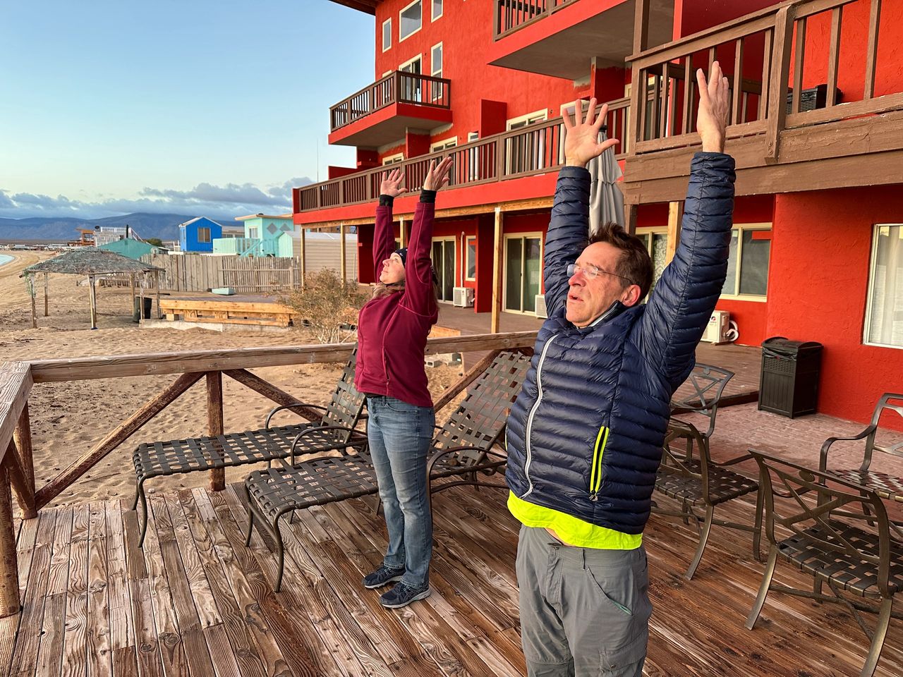 Rebecca and Gene being held at gunpoint...or doing morning stretches...not sure which. Rebecca and Gene being held at gunpoint...or doing morning stretches...not sure which.