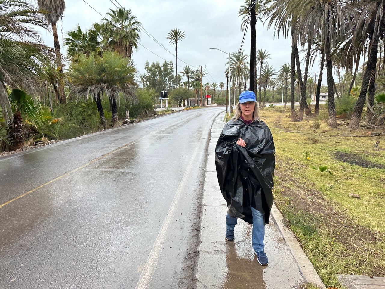 Rebecca modeling the last in women's rain gear. Rebecca modeling the last in women's rain gear.