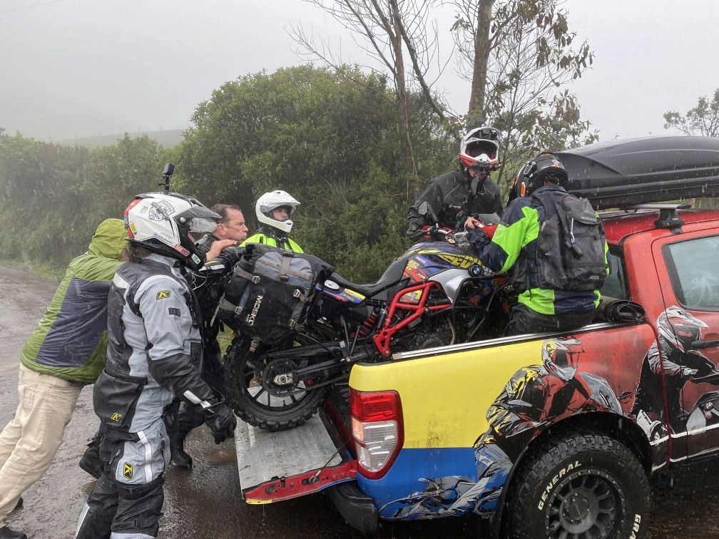Loading the damaged bike into the support truck