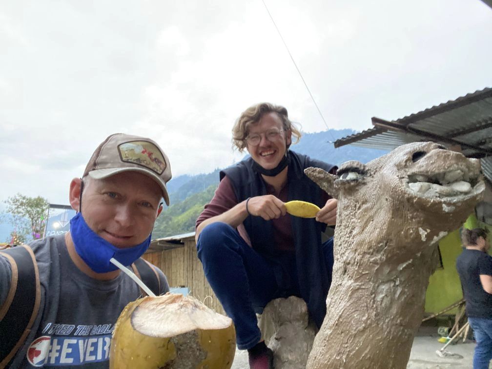 Enjoying a coco frio after hiking the waterfalls
