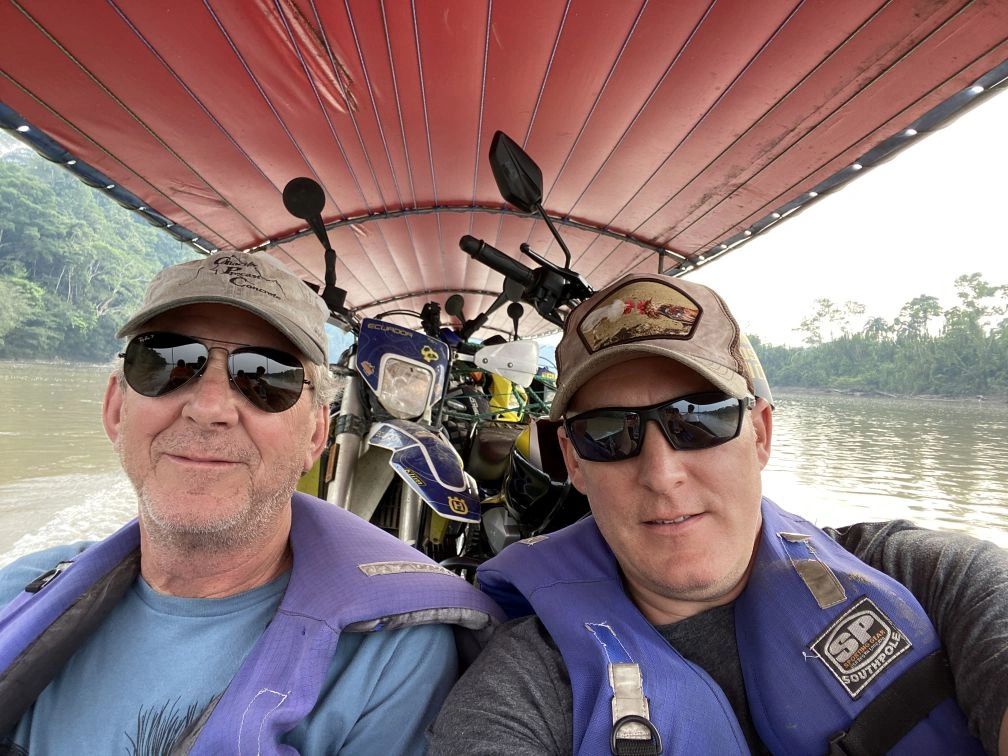 Riding canoe with bikes down the river