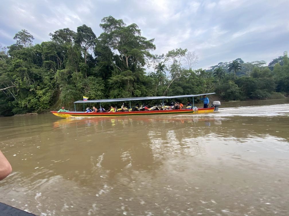 Canoe with bikes on the river
