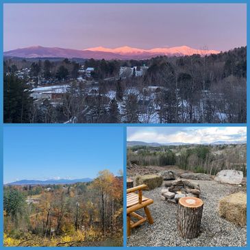 Snowy mountain range at sunset over a forested village.