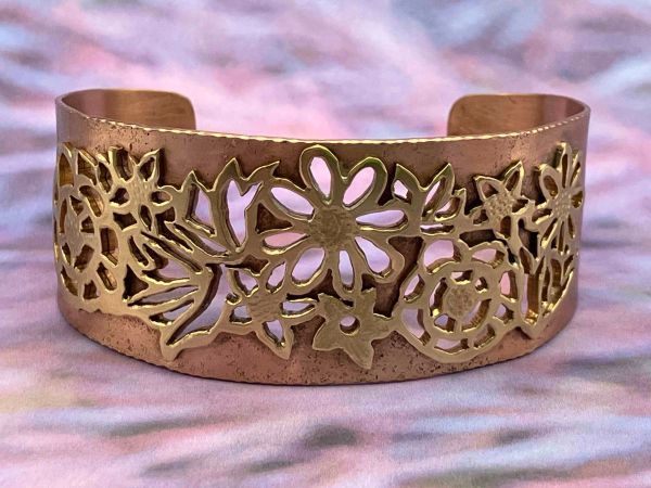 Intricately designed floral cuff bracelet.