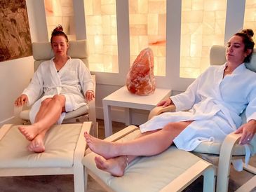 halotherapy, two women relaxing in the salt therapy room, Himalayan salt cave