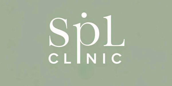 A scenic view of mountains with a sunset, showcasing vibrant colors in the sky and reflecting on a calm lake.