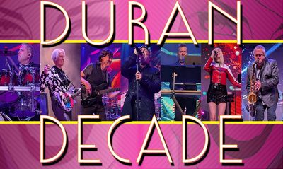 Duran Duran band members performing live on stage with vibrant lighting.