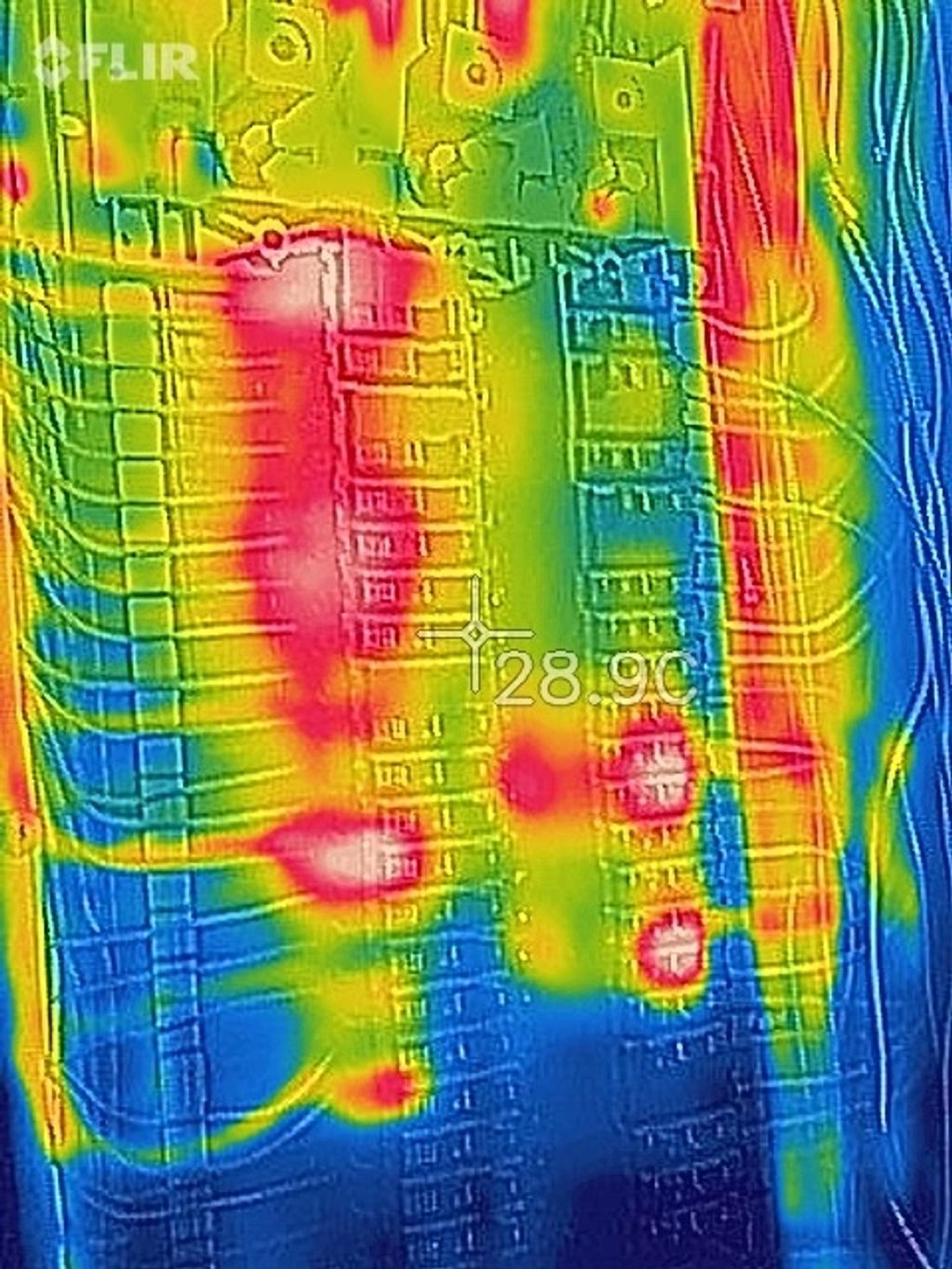 Thermal image of an electrical panel showing hot spots.
