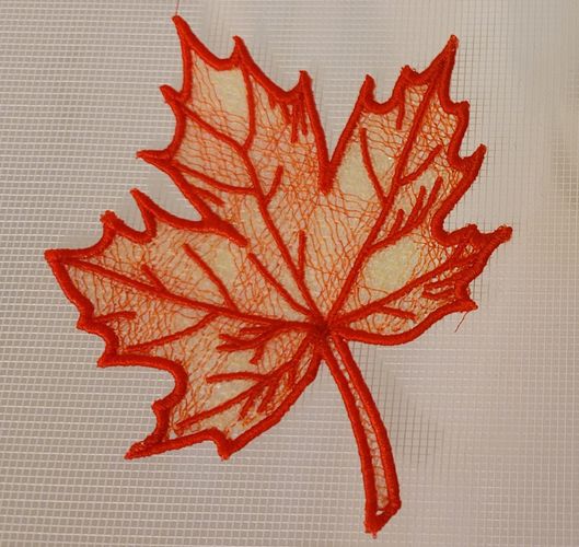 Machine embroidered free standing lace fall colored maple leaf