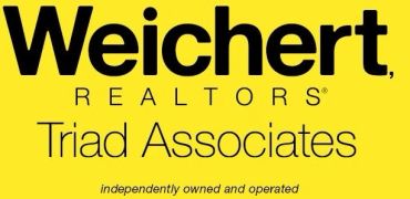 Weichert Realtors Triad Associates logo on yellow background.