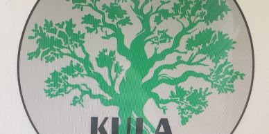 Green tree logo with the word KUDA.