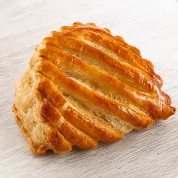 Golden-brown baked pastry with ridged top.