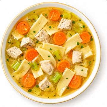 Chicken noodle soup with carrots and celery.