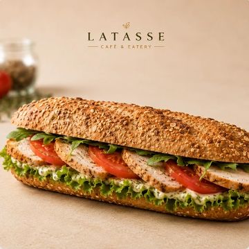 Grilled chicken sandwich with lettuce and tomato.