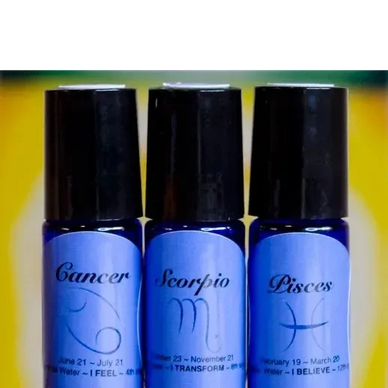 Three blue bottles labeled Cancer, Scorpio, and Pisces.