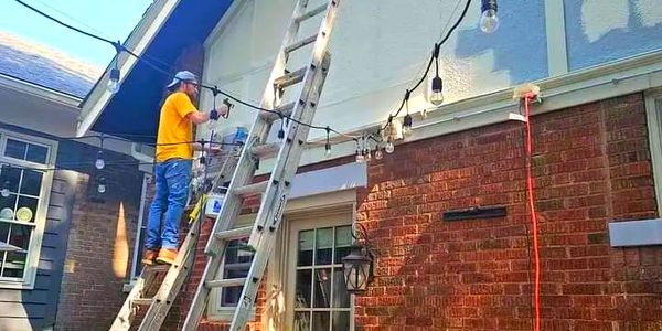 spraying the exterior of a residential job
